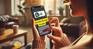 A woman texting on a smartphone with the gorilla emoji 🦍 prominently displayed in the text message. The scene is set in a casual environment with warm lighting.