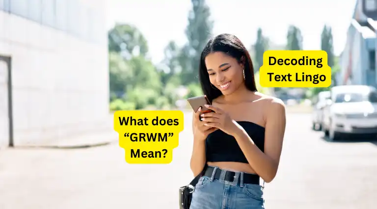 A young woman smiling while looking at her phone, with text overlayed that reads, "What does 'GRWM' Mean?" and "Decoding Text Lingo.